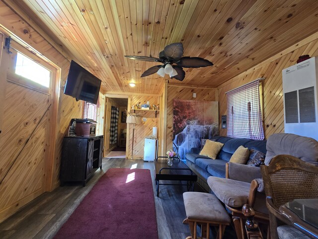 12259 Niemi, Kaleva, MI 49645 - living area with wood walls, wood finished floors, wooden ceiling, and a ceiling fan