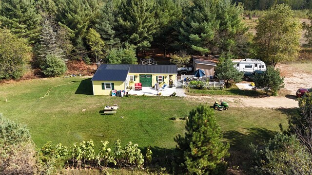 12259 Niemi, Kaleva, MI 49645 - view of subject property with a heavily wooded area