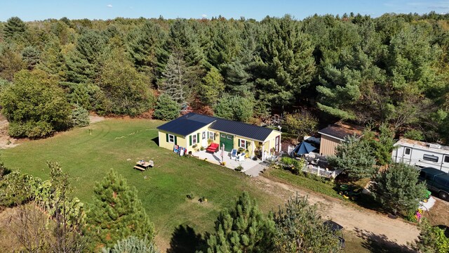 12259 Niemi, Kaleva, MI 49645 - view of subject property with a heavily wooded area
