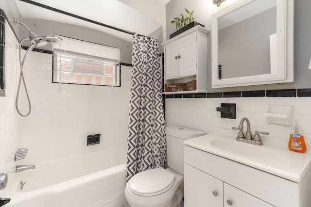 full bathroom featuring tile walls, vanity, shower / tub combo, and toilet