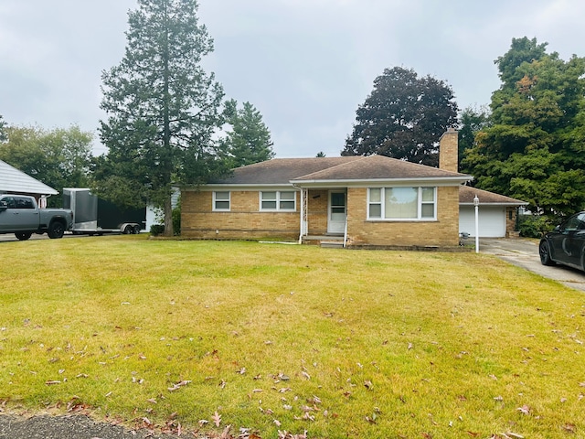 ranch-style house with a garage and a front lawn