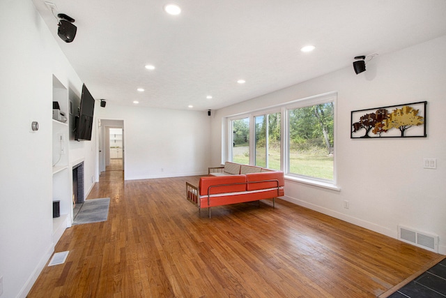 living room with dark hardwood / wood-style floors