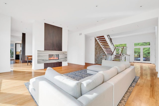 living room with light hardwood / wood-style floors