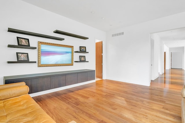 living room with light hardwood / wood-style flooring