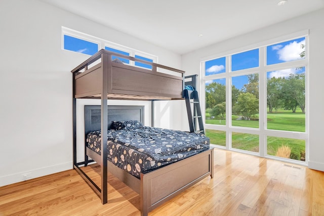 bedroom featuring light hardwood / wood-style floors