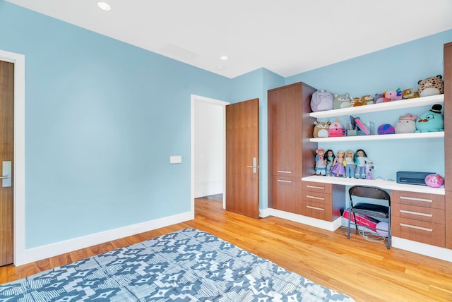 home office with light wood-type flooring