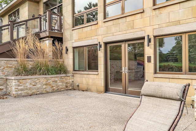 doorway to property with a patio and french doors