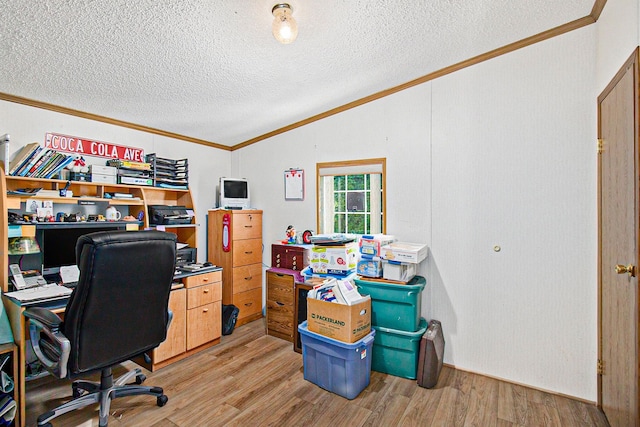 home office with light wood-type flooring, a textured ceiling, and ornamental molding