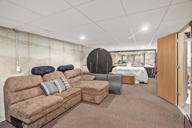 bedroom with carpet and a drop ceiling