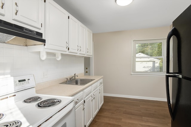 kitchen with black refrigerator, sink, white electric range, dark hardwood / wood-style floors, and white cabinetry