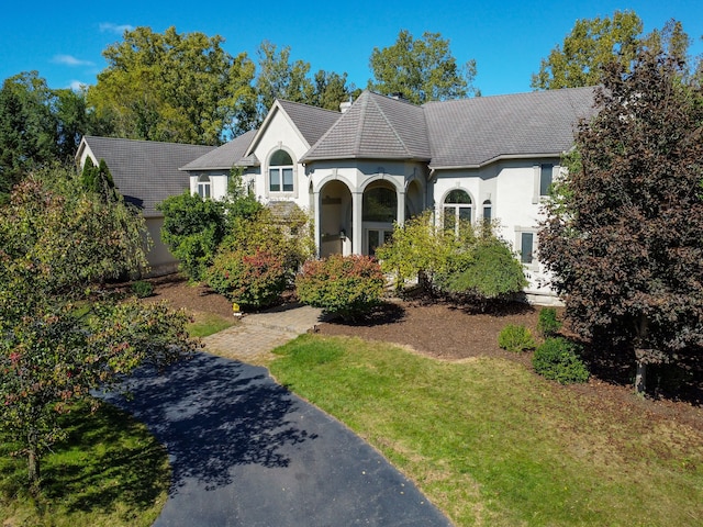 view of front of home with a front yard