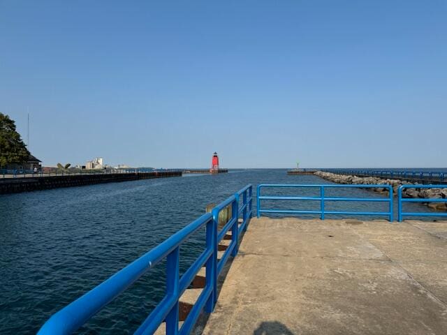 dock area featuring a water view