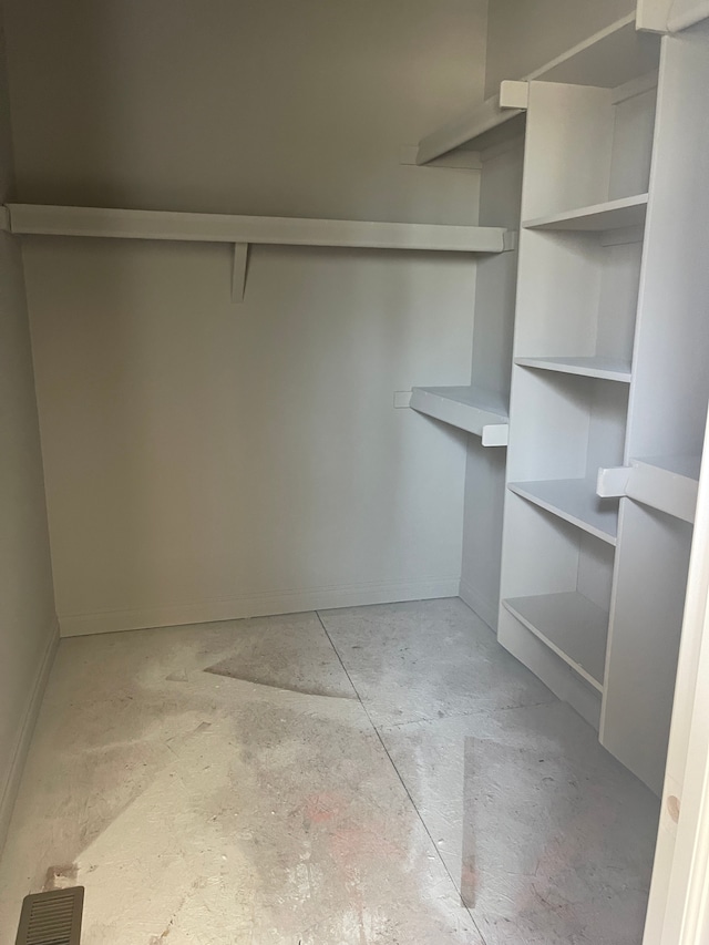 walk in closet with visible vents