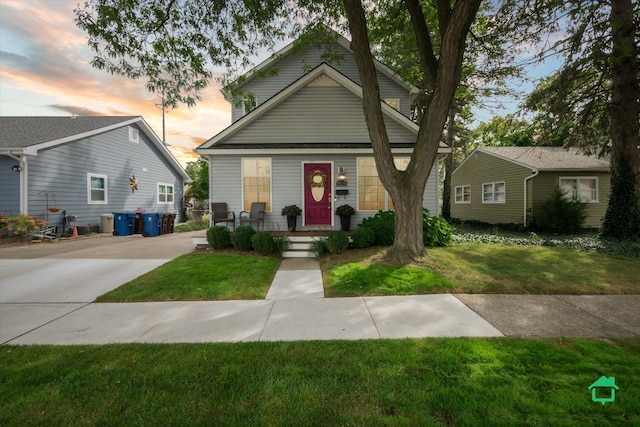 view of front of house with a yard