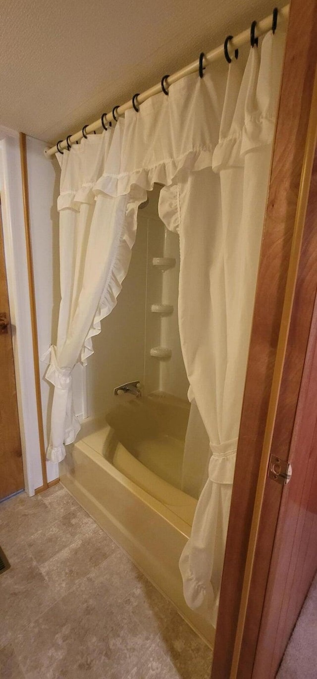 bathroom with a textured ceiling