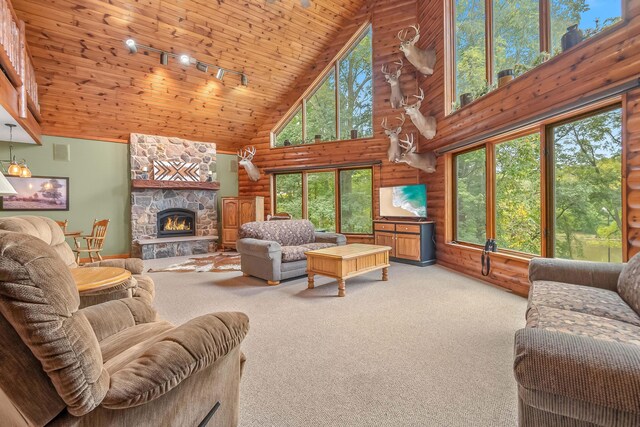 2488 Wilson St, Hillsdale, MI 49242 - living room with high vaulted ceiling, light carpet, a fireplace, and wooden ceiling