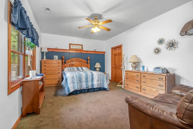 carpeted bedroom featuring ceiling fan