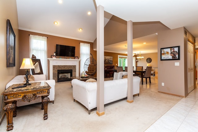 living room with vaulted ceiling, crown molding, light carpet, and an inviting chandelier