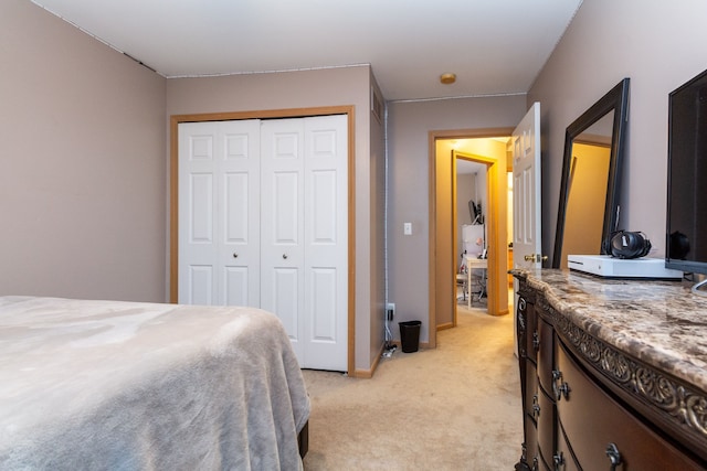 carpeted bedroom featuring a closet