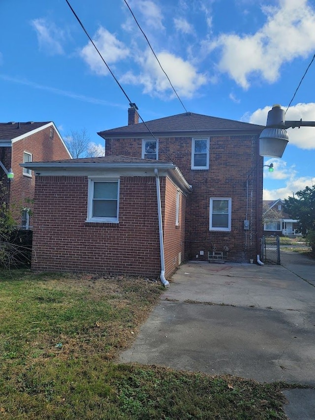 rear view of property with a patio area