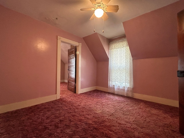 bonus room featuring ceiling fan, carpet floors, and lofted ceiling