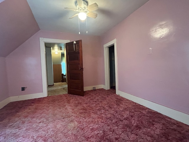 additional living space featuring ceiling fan, carpet floors, and vaulted ceiling