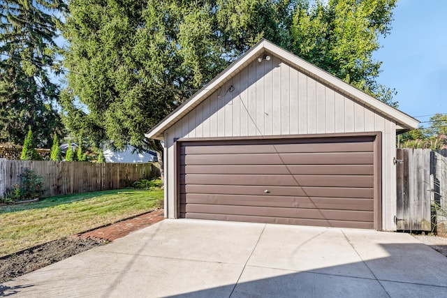 garage with a yard