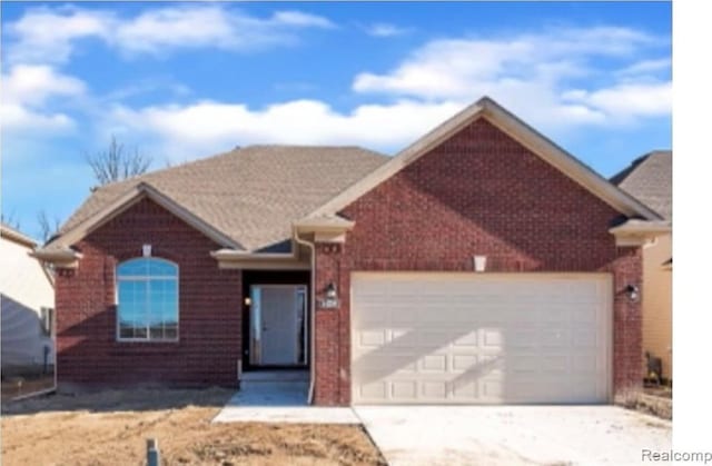 view of front of home with a garage