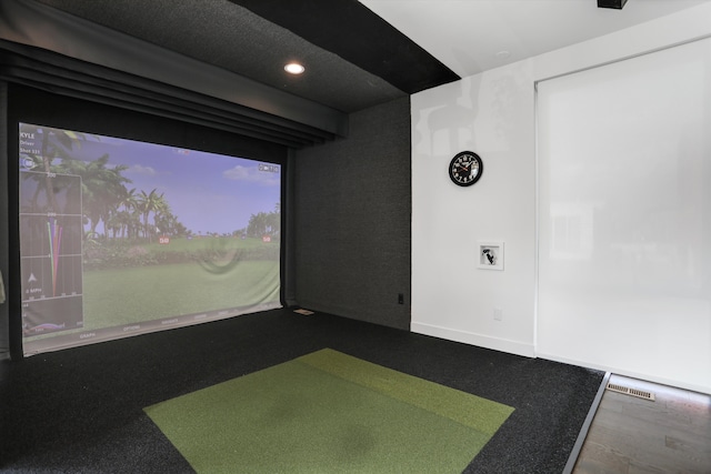 playroom with golf simulator