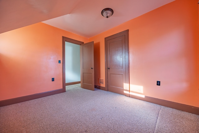 unfurnished bedroom featuring carpet floors