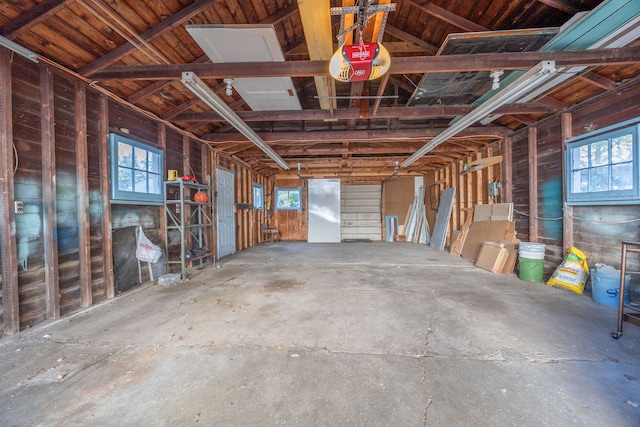 misc room featuring a wealth of natural light and concrete flooring