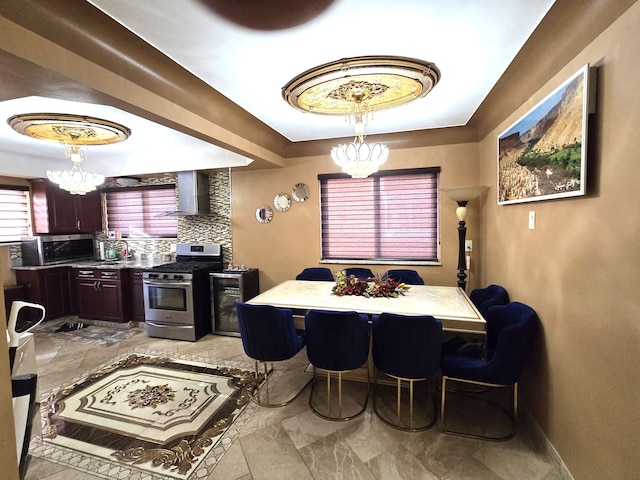 dining area featuring an inviting chandelier