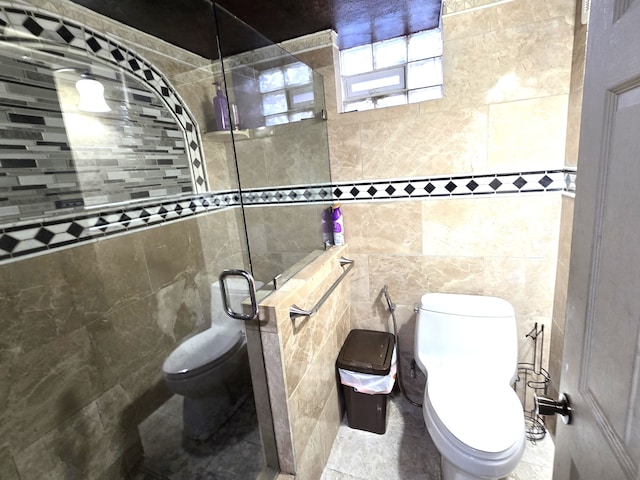 bathroom with toilet, walk in shower, and tile walls