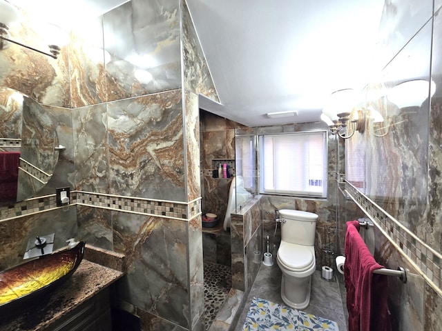 bathroom featuring toilet, tile walls, and tiled shower