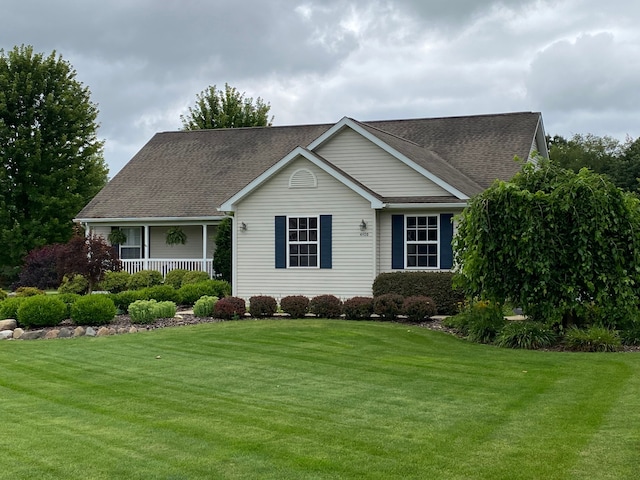 single story home featuring a front yard and a porch