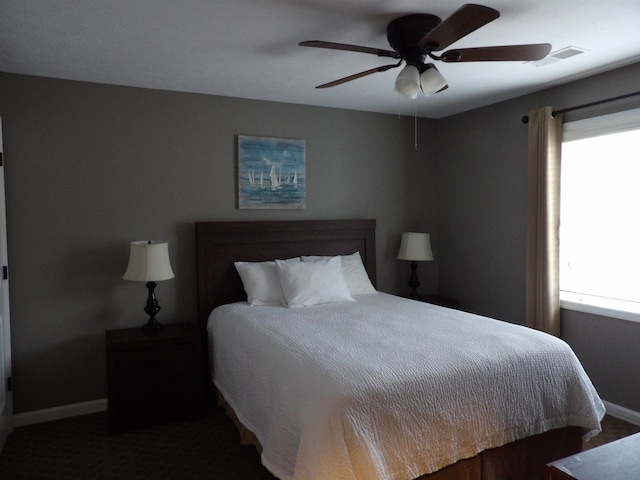 bedroom featuring ceiling fan