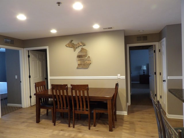 dining room featuring light hardwood / wood-style floors