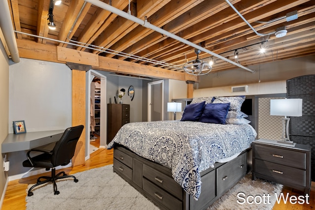 bedroom with light hardwood / wood-style floors