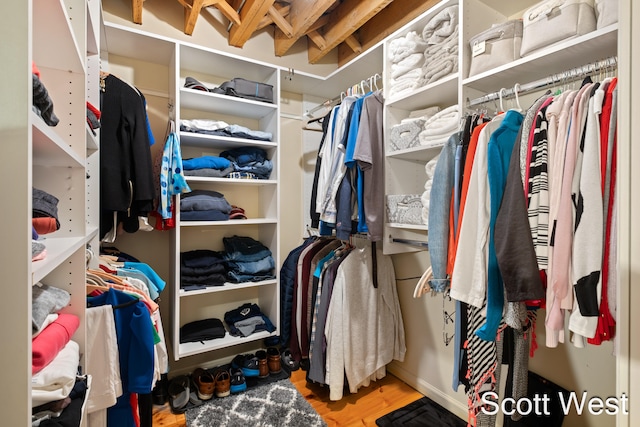 walk in closet featuring light hardwood / wood-style floors