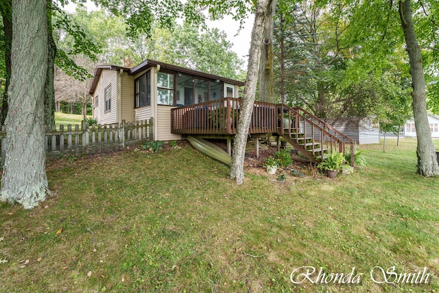 view of yard featuring a wooden deck