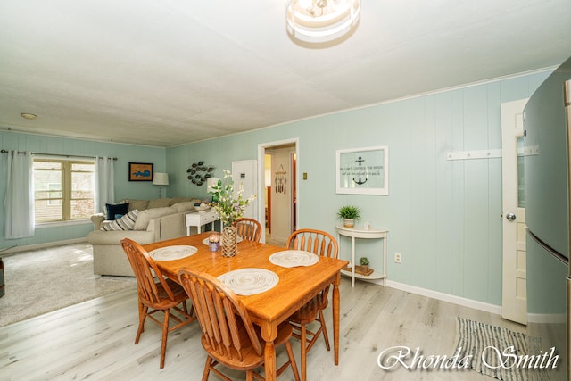 dining space featuring light hardwood / wood-style floors