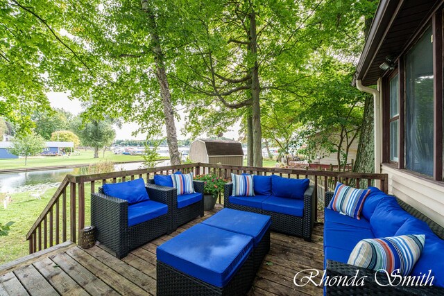11432 Lakeshore Dr, Lakeview, MI 48850 - deck with outdoor lounge area and a water view