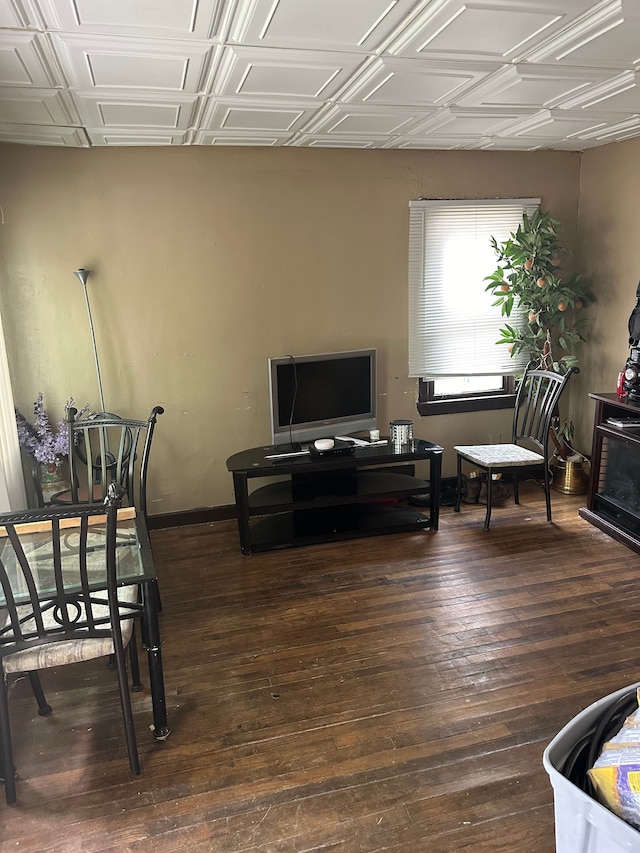 living room with dark hardwood / wood-style flooring