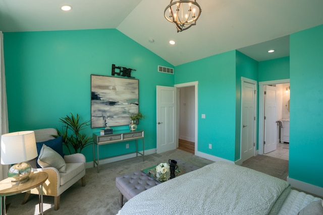 bedroom featuring a chandelier, light colored carpet, ensuite bath, and lofted ceiling