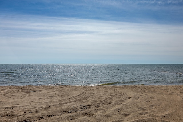 property view of water featuring a beach view