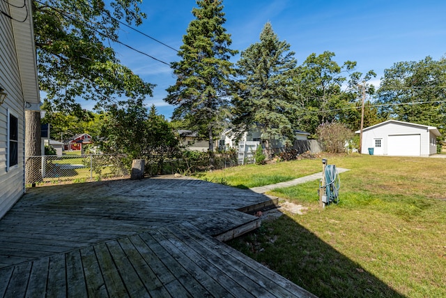 wooden terrace with a lawn