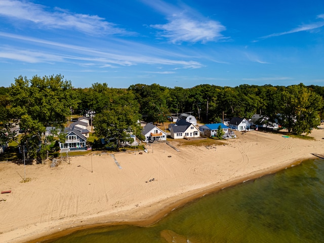 bird's eye view with a view of the beach and a water view