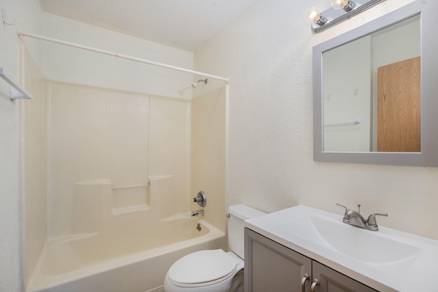 full bathroom featuring vanity, toilet, and bathing tub / shower combination