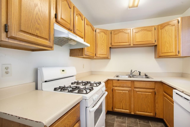 kitchen with white appliances and sink