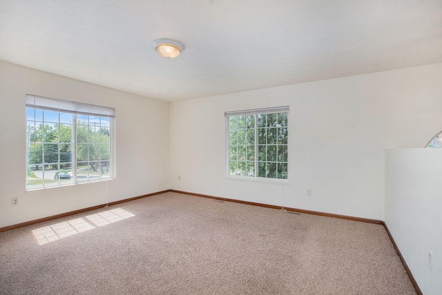 view of carpeted spare room